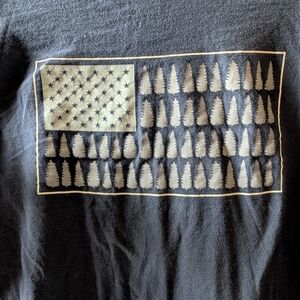 Black Graphic Tee with Tree and Star Design